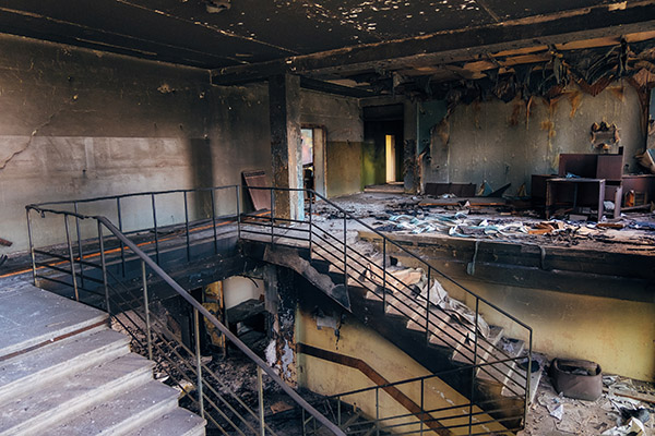 Burned interiors after fire in industrial or office building.